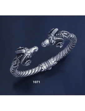 1071 Hand-coiled Ram's head torc bracelet (L)