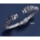 1072 Hand-coiled Lion's head torc bracelet (L)